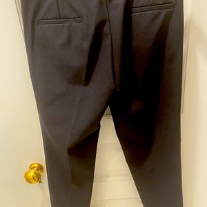 Black Gucci pants.